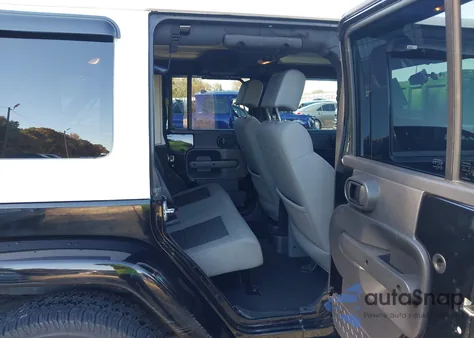 2010 Jeep Wrangler Unlimited Sahara z USA, uszkodzony, nr VIN 1J4BA5H13AL225975